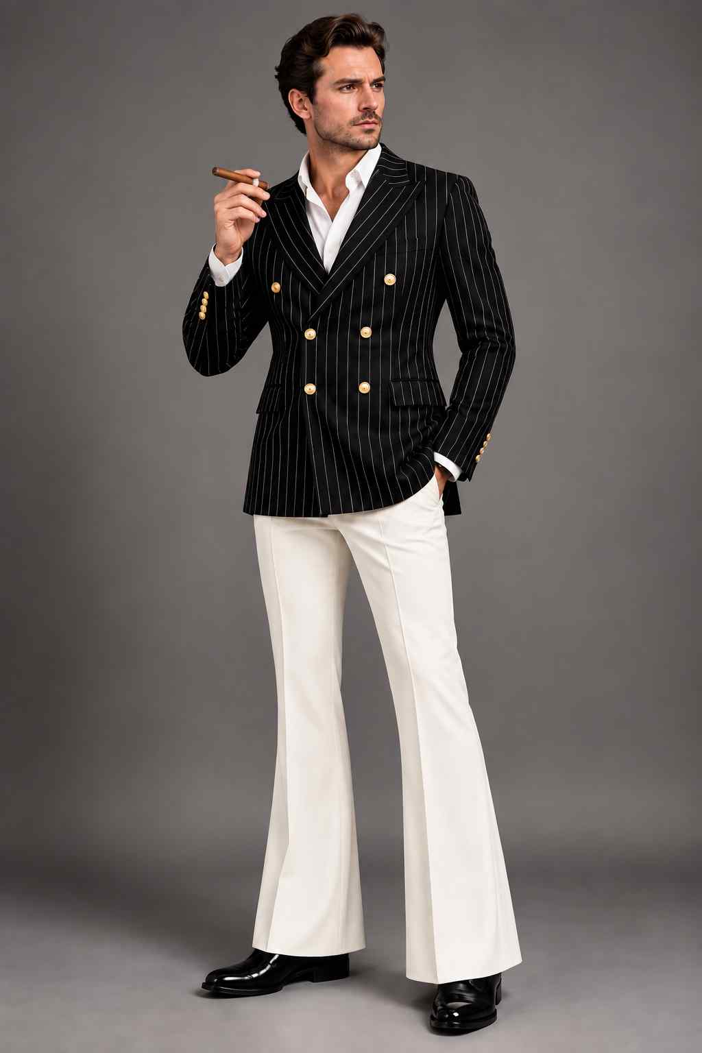 Men's black pinstripe double-breasted suit with peak lapel blazer, gold-tone buttons and contrasting white trousers.