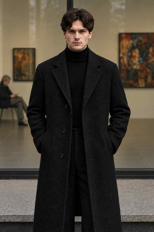 Men’s black tweed wool long coat, vintage-style tailored winter overcoat with classic lapels and button closure.