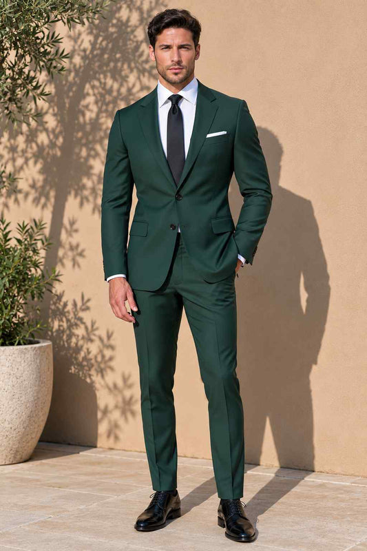 Men’s green 2-piece suit with notch lapel jacket, matching tailored trousers, white shirt, black tie and pocket square.