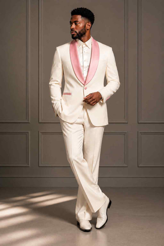 Men’s ivory tuxedo suit with pink shawl lapel, pink pocket trim and matching formal details