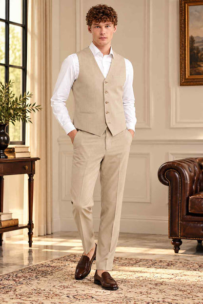 Men’s beige tailored vest with V-neck, button front, chest pocket, welt pockets, and pointed hem.