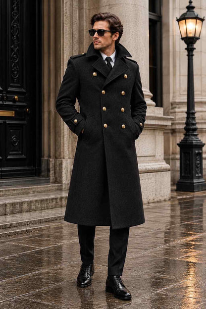 Men's black tweed double-breasted long coat with gold-tone buttons, wide lapels, shoulder epaulettes and full-length vintage design.
