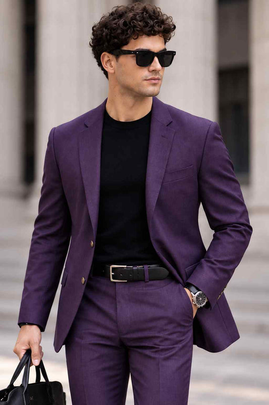 Men's purple 2-piece suit with notch lapel blazer and matching tailored trousers, styled for modern formal wear.