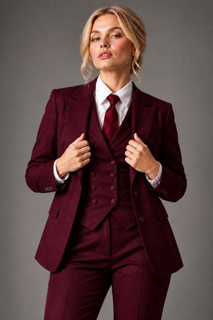 Women’s burgundy 3-piece suit with peak lapel blazer, matching waistcoat and tailored trousers